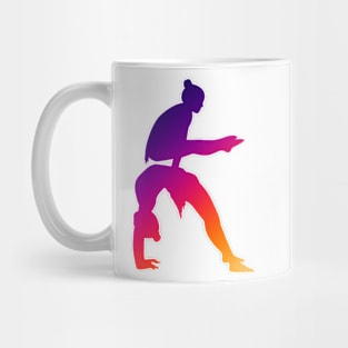 A women’s pair doing straddle on bridge Mug